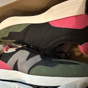 New Balance shoes. Men size 11. Black, green and pink. Brand new in box.